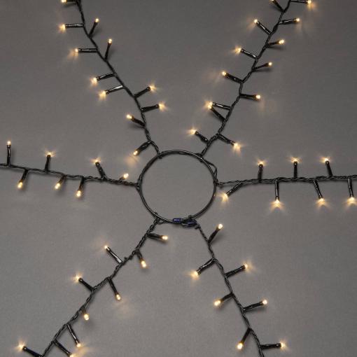 Konstsmide 6651-100 LED světelný plášť na vánoční stromeček venkovní Energetická třída (EEK2021): E (A - G) 230 V Počet žárovek 1080 LED teplá bílá Délka