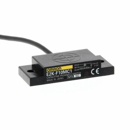 Omron Kapacitní snímač přiblížení E2K-F10MC1 2M Plochý E2K-F 10 mm 100mA IP64 100 Hz NPN 30 V dc